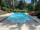 Sparkling in-ground pool with plenty of lounge chairs at 10781 Cedar Ridge Ln, Brownsburg, IN 46278