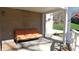 Covered porch with brick walls and comfortable seating at 10781 Cedar Ridge Ln, Brownsburg, IN 46278
