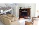 Spacious living room boasts a large sectional sofa and an entertainment center at 10781 Cedar Ridge Ln, Brownsburg, IN 46278