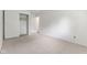 Bright bedroom with carpet, a double-door closet, and access to a bathroom at 9263 Golden Oaks W, Indianapolis, IN 46260