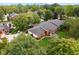 Aerial view of the home and community, highlighting its location near a pond at 9263 Golden Oaks W, Indianapolis, IN 46260