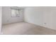 Simple carpeted bedroom with a window and neutral walls at 9263 Golden Oaks W, Indianapolis, IN 46260