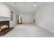 Living room with a cozy fireplace and carpet flooring at 9263 Golden Oaks W, Indianapolis, IN 46260