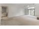 Open living room with carpet and access to other rooms at 9263 Golden Oaks W, Indianapolis, IN 46260