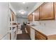 View of kitchen with wood cabinets and appliances at 9263 Golden Oaks W, Indianapolis, IN 46260