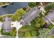 Aerial view of home near pond, showcasing community and landscape at 9263 Golden Oaks W, Indianapolis, IN 46260