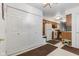 Bright entryway with view of kitchen and closet space at 9263 Golden Oaks W, Indianapolis, IN 46260