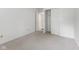 Bright bedroom with carpet, a closet, and access to a bathroom at 9263 Golden Oaks W, Indianapolis, IN 46260