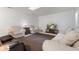 Finished basement recreation area with seating at 9263 Golden Oaks W, Indianapolis, IN 46260