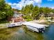Lakefront home with expansive deck, private dock, and boat lift at 4161 S Summit Ln, Columbus, IN 47201