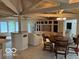 Open concept living room with dining area and vaulted ceiling at 4161 S Summit Ln, Columbus, IN 47201