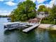 Lakefront home with private dock and sandy beach area at 4161 S Summit Ln, Columbus, IN 47201