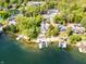 Large lakefront home with private dock and surrounding homes at 4161 S Summit Ln, Columbus, IN 47201