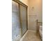 Bathroom with a shower and gold-toned accents at 4161 S Summit Ln, Columbus, IN 47201