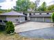 Lakefront home with three-car garage and circular driveway at 4161 S Summit Ln, Columbus, IN 47201