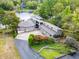 Multi-level lakefront home with large deck and attached garage at 4161 S Summit Ln, Columbus, IN 47201