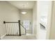 Upstairs hall with staircase and bedroom access at 6390 Torrington St, Brownsburg, IN 46112