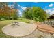 Large backyard patio with seating area and lake views at 3958 E Edgewood Cir, Martinsville, IN 46151
