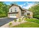 Two-story home with a stone facade and attached garage at 3958 E Edgewood Cir, Martinsville, IN 46151