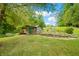 Charming garden shed with pergola and colorful fence at 3958 E Edgewood Cir, Martinsville, IN 46151
