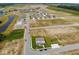 Aerial view of new homes and roads in Miles Farm community at 1561 Hanover St, Danville, IN 46122