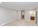 Large bedroom with an ensuite bathroom and plush, neutral-colored carpet at 7306 W County Road 600 Rd # 14-602, McCordsville, IN 46055