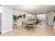 Bright dining area with light wood floors and seating for four at 7306 W County Road 600 Rd # 14-602, McCordsville, IN 46055