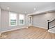 Bright foyer with wood-look flooring and a view of the front door at 7306 W County Road 600 Rd # 14-602, McCordsville, IN 46055