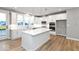 Modern kitchen featuring white cabinets, a center island, and stainless steel appliances at 7306 W County Road 600 Rd # 14-602, McCordsville, IN 46055