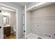 Laundry room with wire shelving, washer/dryer hookups, and adjacent bathroom access at 7306 W County Road 600 Rd # 14-602, McCordsville, IN 46055