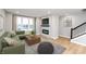 Spacious living room featuring a fireplace and large windows at 7306 W County Road 600 Rd # 14-602, McCordsville, IN 46055