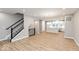 Open living room area overlooking kitchen and staircase at 7306 W County Road 600 Rd # 14-602, McCordsville, IN 46055