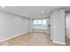 Living room with large windows, hardwood flooring and fireplace at 7306 W County Road 600 Rd # 14-602, McCordsville, IN 46055