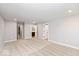 Spacious bedroom with plush carpet and ensuite bathroom at 7310 W County Road 600 Rd # 14-603, McCordsville, IN 46055