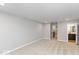 Large bedroom with plush carpeting, an ensuite bathroom, and access to a loft at 7310 W County Road 600 Rd # 14-603, McCordsville, IN 46055