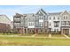 Modern townhouses with colorful doors and inviting curb appeal at 7310 W County Road 600 Rd # 14-603, McCordsville, IN 46055