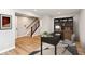 Home office with a desk, bookcase, and hardwood floors at 7310 W County Road 600 Rd # 14-603, McCordsville, IN 46055