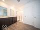 Modern bathroom with double vanity and shower at 1537 Hanover St, Danville, IN 46122