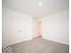 Spacious bedroom with double doors and carpet at 1537 Hanover St, Danville, IN 46122
