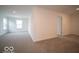 Large bedroom with carpet flooring and multiple windows at 1537 Hanover St, Danville, IN 46122