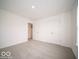 Spacious bedroom with double doors and carpet at 1537 Hanover St, Danville, IN 46122