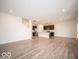 Open concept kitchen with dark cabinets and island at 1537 Hanover St, Danville, IN 46122