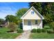 Small yellow guest house with a stone pathway at 4176 N 625 W, Bargersville, IN 46106