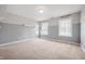 Grey bedroom with window seat and custom wall lettering at 4176 N 625 W, Bargersville, IN 46106