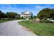Stunning two-story home with gravel driveway and mature trees at 4176 N 625 W, Bargersville, IN 46106