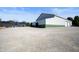 Large white and green barn with gravel parking area at 4176 N 625 W, Bargersville, IN 46106
