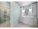Elegant bathroom with a walk-in shower and double vanity at 4176 N 625 W, Bargersville, IN 46106