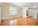 Eat-in kitchen with white cabinets, hardwood floors, and island at 4176 N 625 W, Bargersville, IN 46106