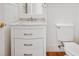 Small bathroom with white vanity, marble countertop, and toilet at 4176 N 625 W, Bargersville, IN 46106