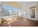 Bright sunroom featuring ample windows and wood flooring at 4176 N 625 W, Bargersville, IN 46106